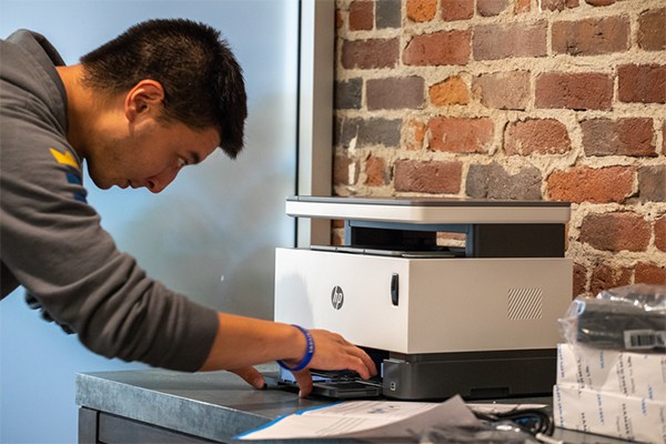 do laser printers use ink?