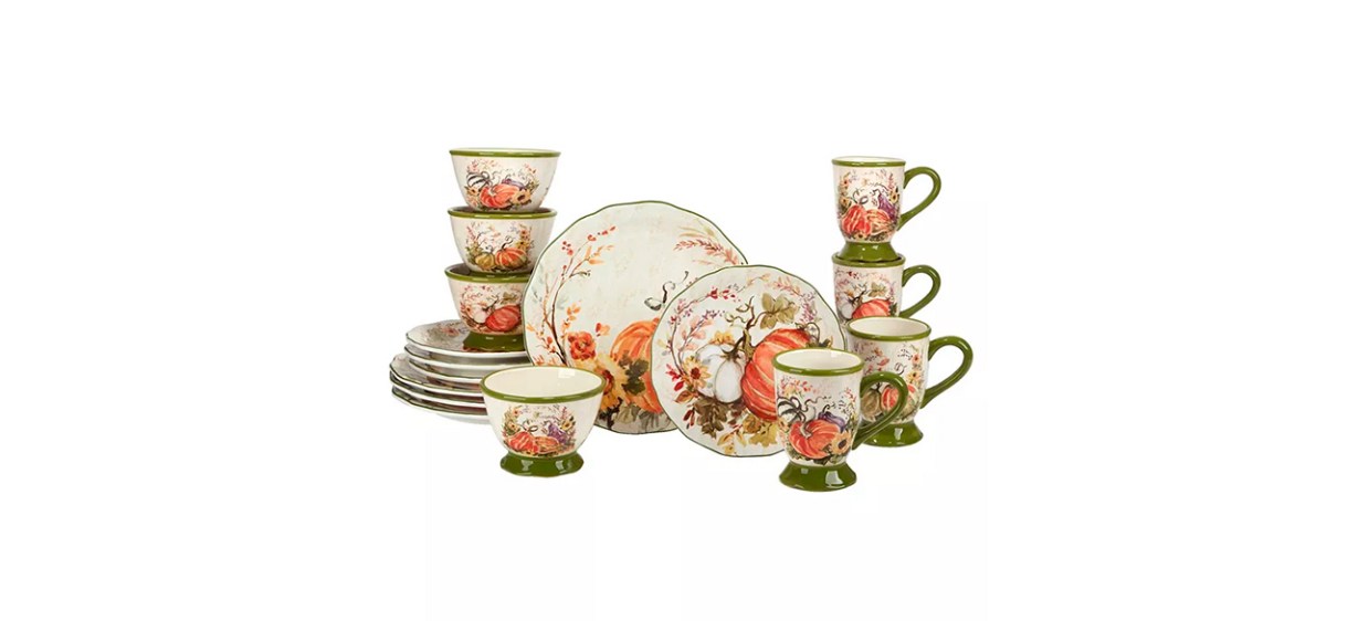 Beige plates, bowls and mugs with green trim and images of orange and white pumpkins with vines