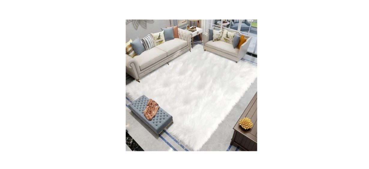 Everly Quinn Leosvel Faux Sheepskin Solid Color Rug