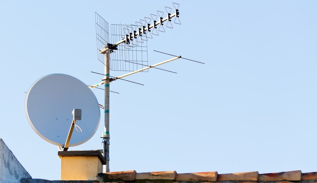 Outdoor TV antenna on roof