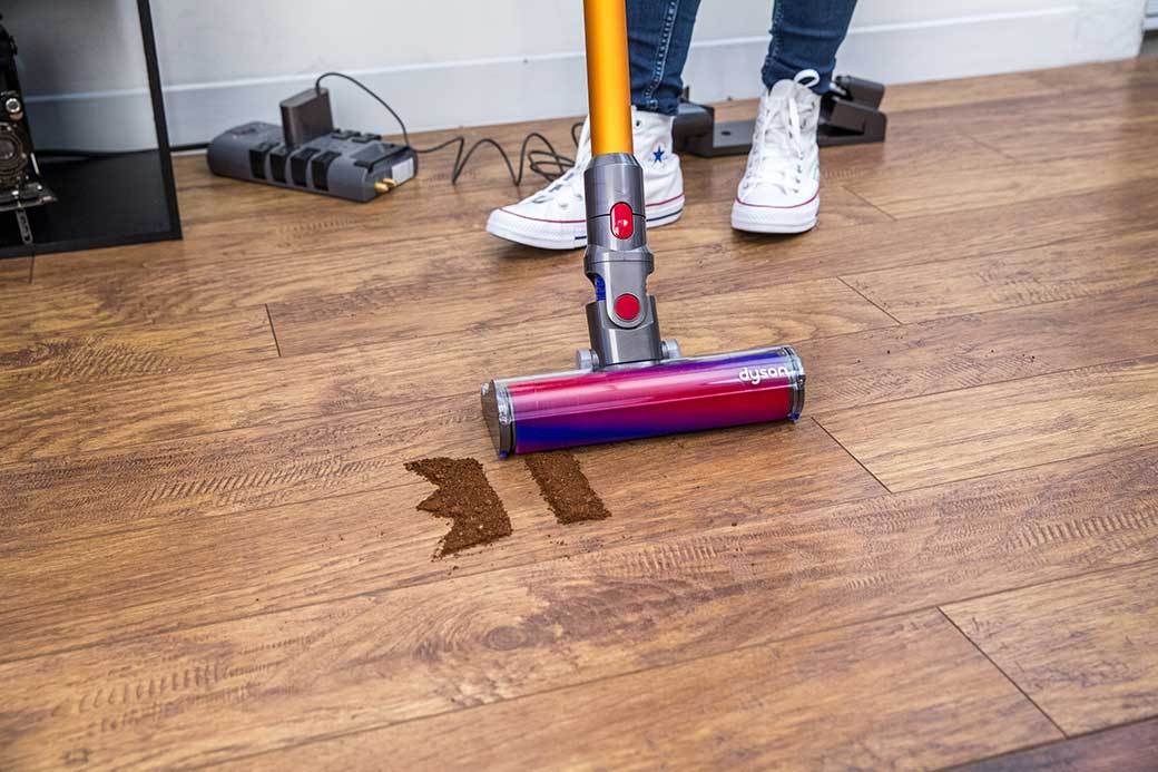cleaning with a Dyson stick vacuum