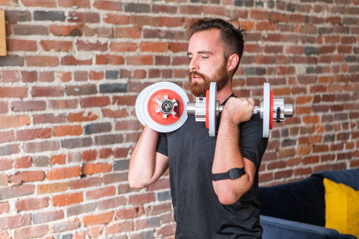 A man lifts weights
