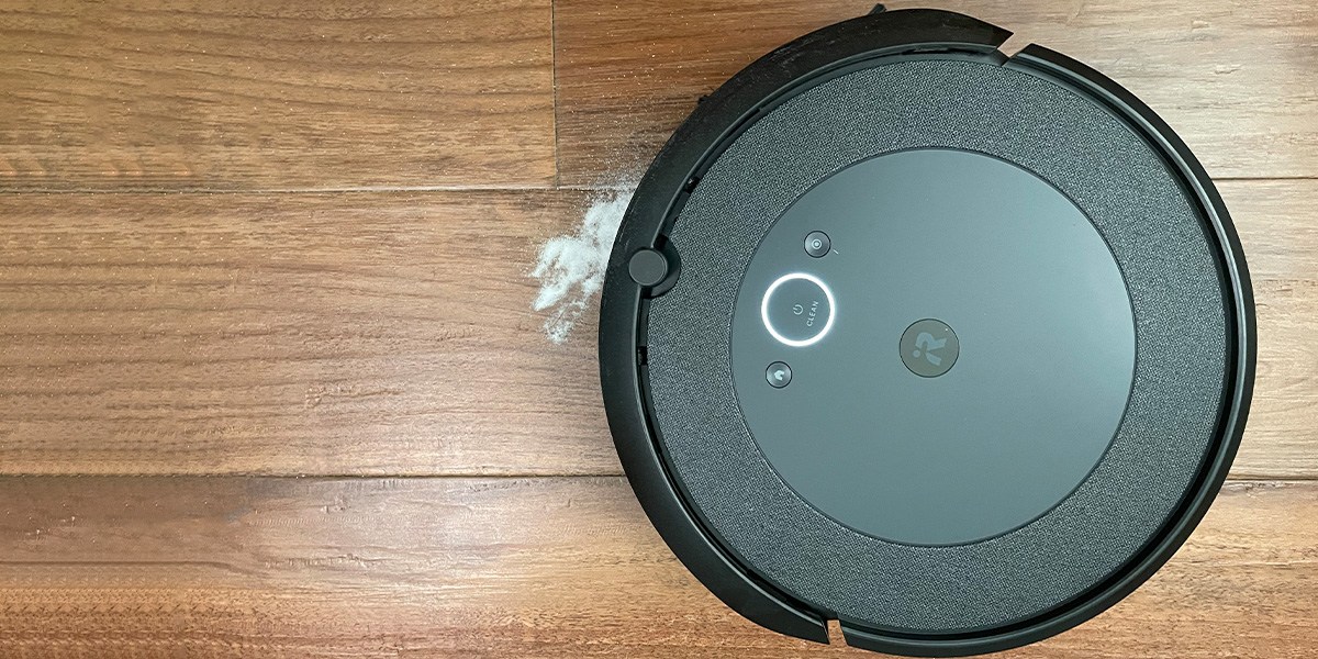 Roomba i4 EVO cleaning debris from vinyl plank flooring