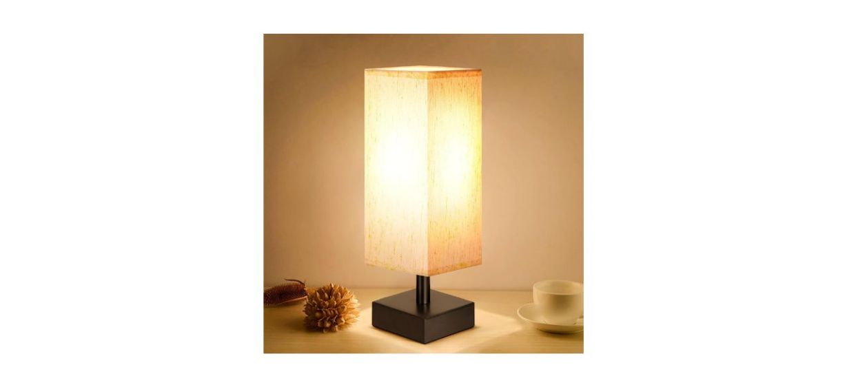 Aooshine Small Table Lamp for Bedroom sitting on a bedside table