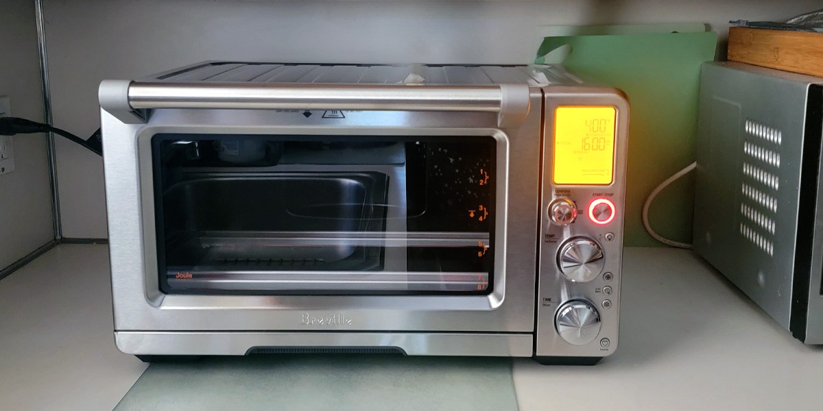Breville Joule Oven Air Fryer Pro with hot dogs inside