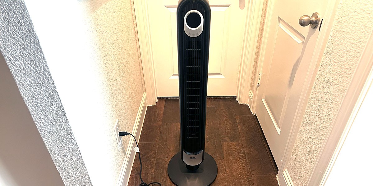Dreo Cruiser Pro T1 Tower Fan-best-tower-fans in front of door in hallway