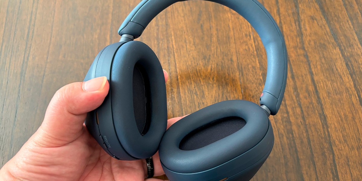 Hand holding  Sony WH-1000XM5