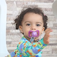 a child with a pacifier