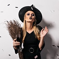 a woman in witch costume